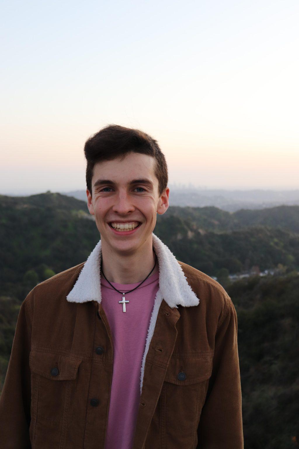 Guitarist Podgorski beams atop the San Gabriel Mountains, up the Angeles Crest Highway, in late February. He said he enjoyed the outdoor photo session with his friends.